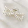 Crab pin with bow