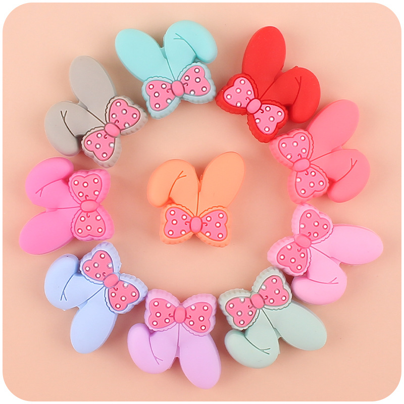 Bebé suministros de dibujos animados de silicona animal conejo mordedor arco DIY Cadena de chupete molar anti-gota cadena pequeños accesorios