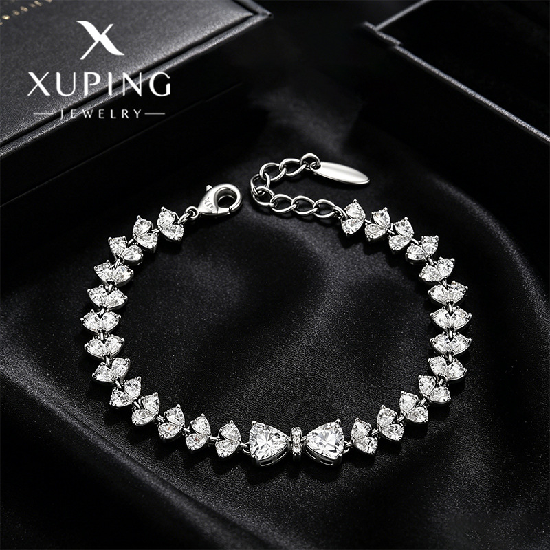 Xuping gemas artificiales incrustadas amor empalme pulsera arco de color aleación de cobre temperamento elegante joyas al por mayor