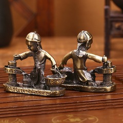 Antique-style collectible, imitation aged bronze-colored alloy, drip gold, boy pushing a stone mill, metal handicraft, decorative piece