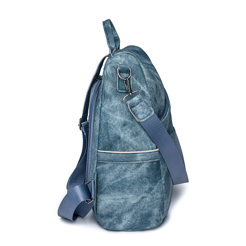 2024 nueva mochila antirrobo casual de color sólido para mujer simple retro al aire libre mochila de viaje ligero de doble uso marea