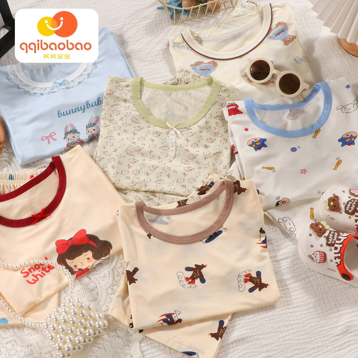 Conjunto de verano de pantalones cortos de manga corta de lyocell para niños y niñas, ropa de dibujos animados con efecto refrescante para niñas.