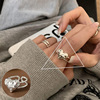 Retro fashionable ring, silver 925 sample, on index finger