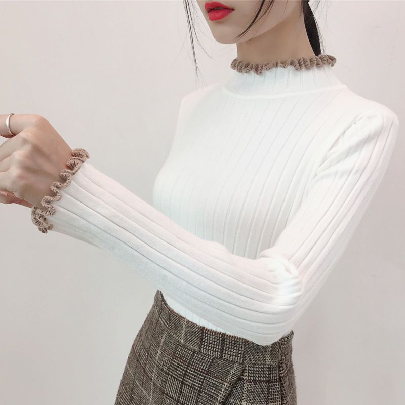 日本式のレースの半高襟のセーターの底のシャツの女性の秋冬の修身の中に白い上着を掛けます。