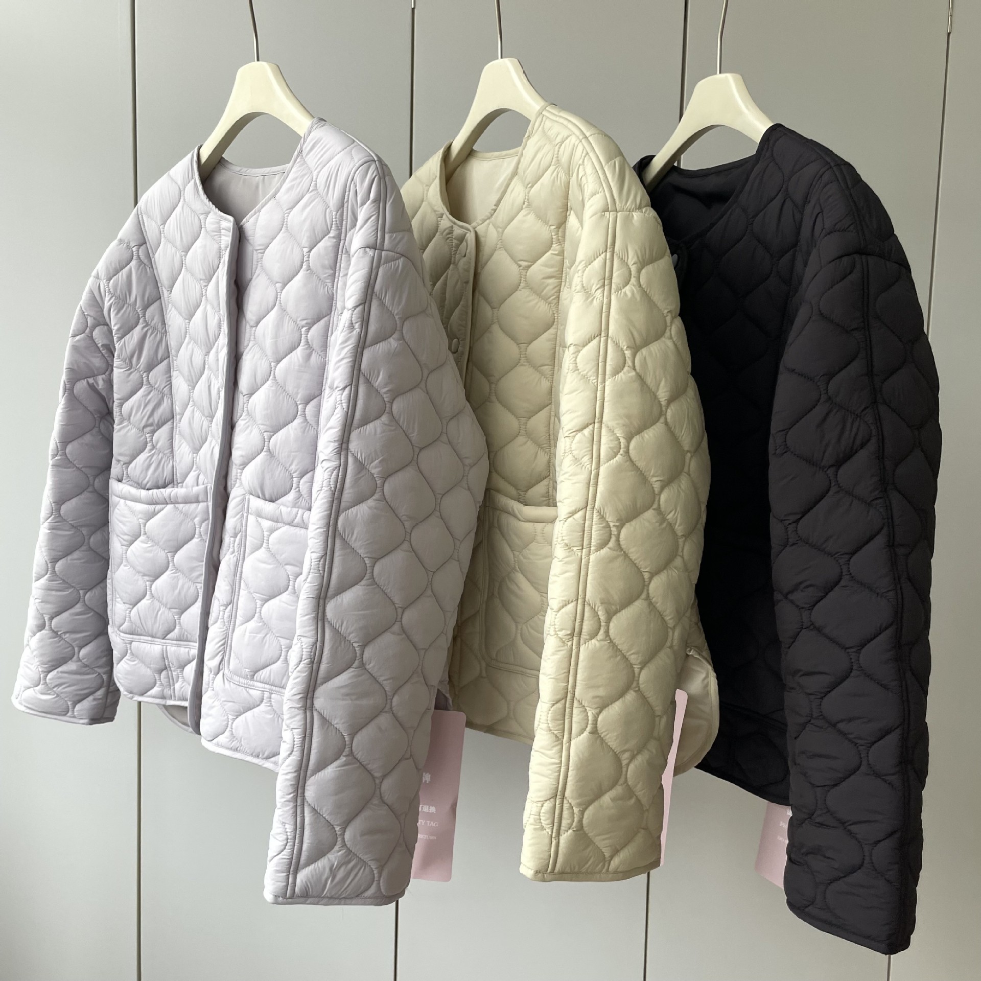 Matte nylon elegant down jacket with a round collar