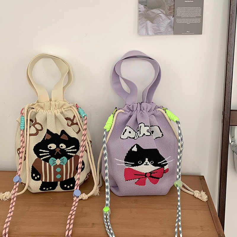Bolsa de cinturón versátil nuevo patrón de dibujos animados nicho lindo bolso de arroz de almuerzo de cuerda bolso de cubo de mano bolso de brazo