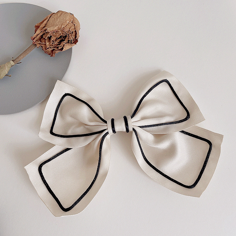 Fashion Retro Bow Simple Contrast Color Hairpin display picture 3