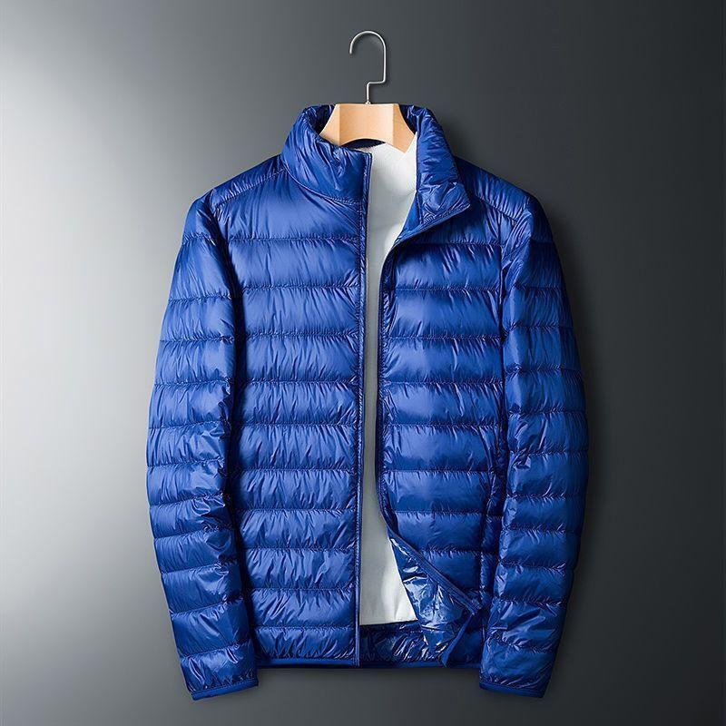 Chaqueta de algodón de terciopelo ligero para hombres de calidad Chaqueta deportiva cálida de moda de otoño e invierno de gran tamaño con cuello alto corto para hombres