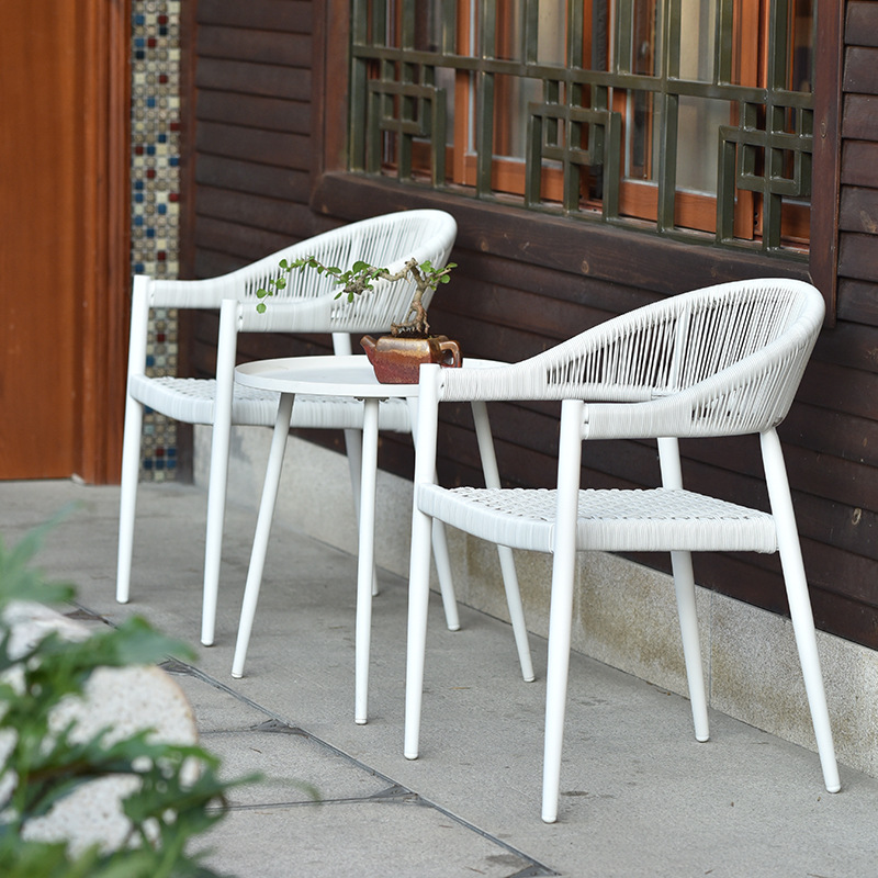 Mesa y silla al aire libre de tela de caña combinación de patio de hotel terraza jardín balcón café tela de caña mesa y silla de lujo al aire libre