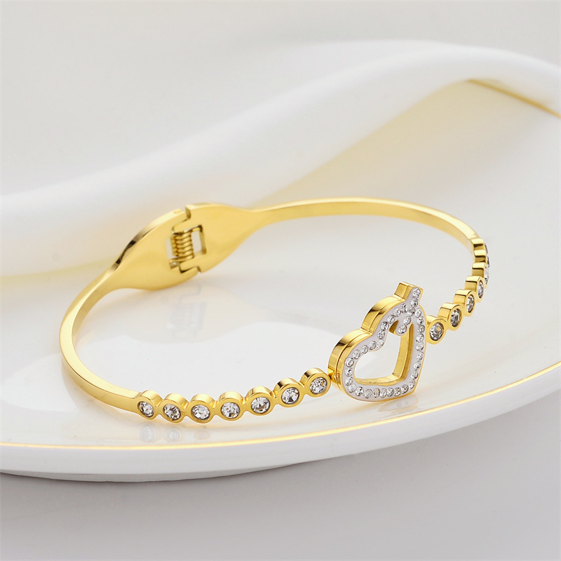 Pulsera de titanio y acero para mujer, diseño moderno y sencillo, pulsera de lujo que no se desvanece, venta al por mayor en stock.