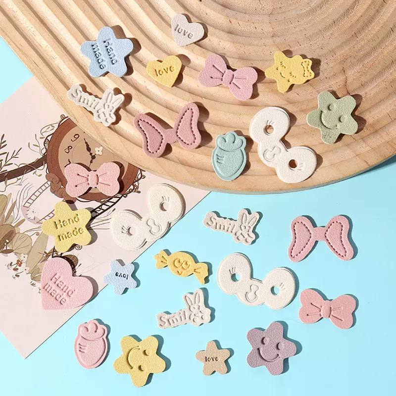 批发蝴蝶结超纤小皮标DIY手工PU皮革压印logo服饰鞋帽商标布贴