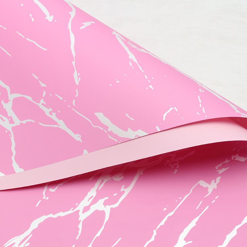 Huaxi Ouya Paper Mármol Papel de embalaje de flores Impresión engrosado Papel de flores impermeable Florería Ramo de flores Embalaje floral