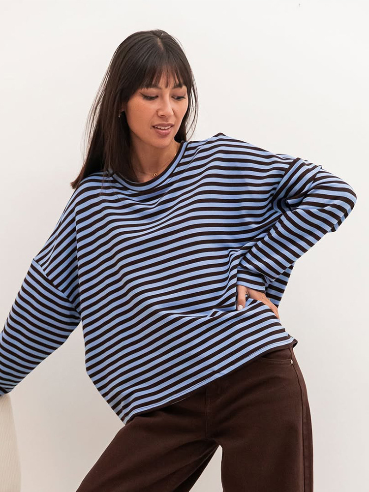 Moda universal relajado cuello redondo de manga larga rayas camiseta de punto 2025 otoño y invierno nuevo estilo europeo y americano transfronterizo