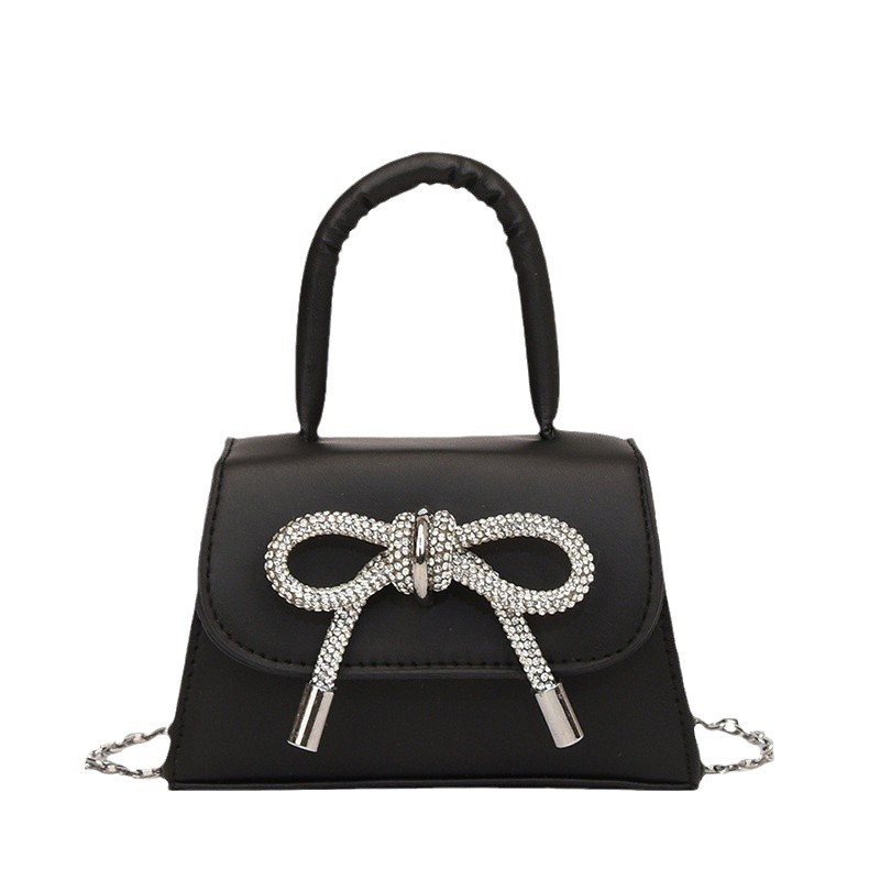 Moda al por mayor arco mini bolso mujer 2025 nuevo mochila bolso de hombro universal bolso de moda mujer