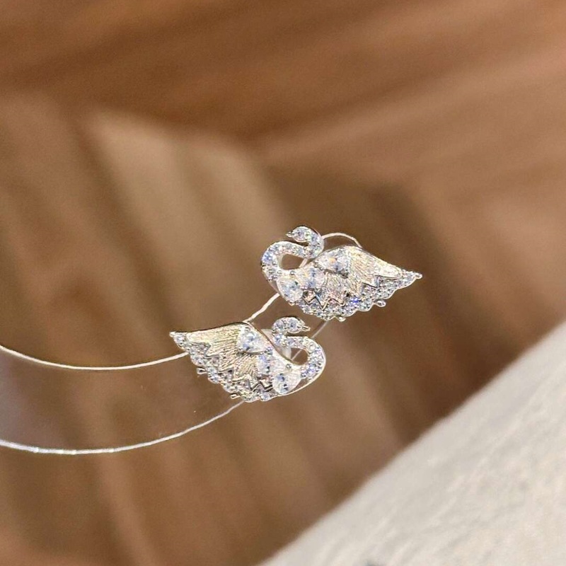 Brushed diamond small swan earrings