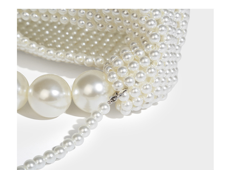 Perlina in stile francese Ins con design cavo, dolce ragazza versatile perla tenuta in mano, croce diagonale a spalla singola intrecciata a mano_voghion.com