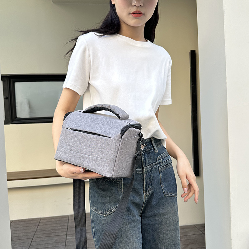 SLR 카메라 가방 캐논 니콘  마이크로 단일 저장 가방 어깨 카메라 가방 60700D200D 경량