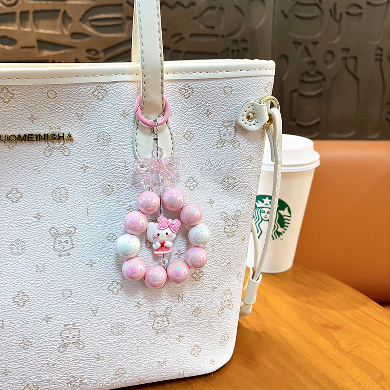 Creativa nueva muñeca pequeña cadena de teléfono móvil llavero colgante bolso lindo accesorios llavero de coche regalo al por mayor