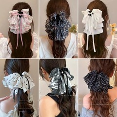 高級感のある蝶結びのリボンは女性の波の点の馬尾のクリップのヘアピンの優しさの気質の半髪でサメのクリップを挟みます。