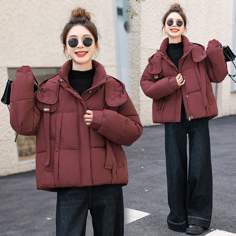 Corea del Sur Dongdamen ropa de algodón de pluma para mujeres corto 2025 invierno nuevo algodón delgado chaqueta con capuz transfronteriza