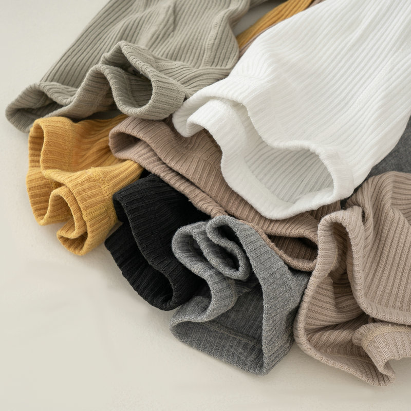 Nuevo color sólido rayas verticales polainas de las muchachas del otoño y el invierno estilo coreano ocasional los niños ropa exterior pantimedias blancas en stock