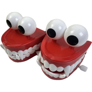 New Strange Toy Coil Chain with Eyes Jumping Teeth Ghost Teeth Cute Children's Fun Small Toy Prank Teeth