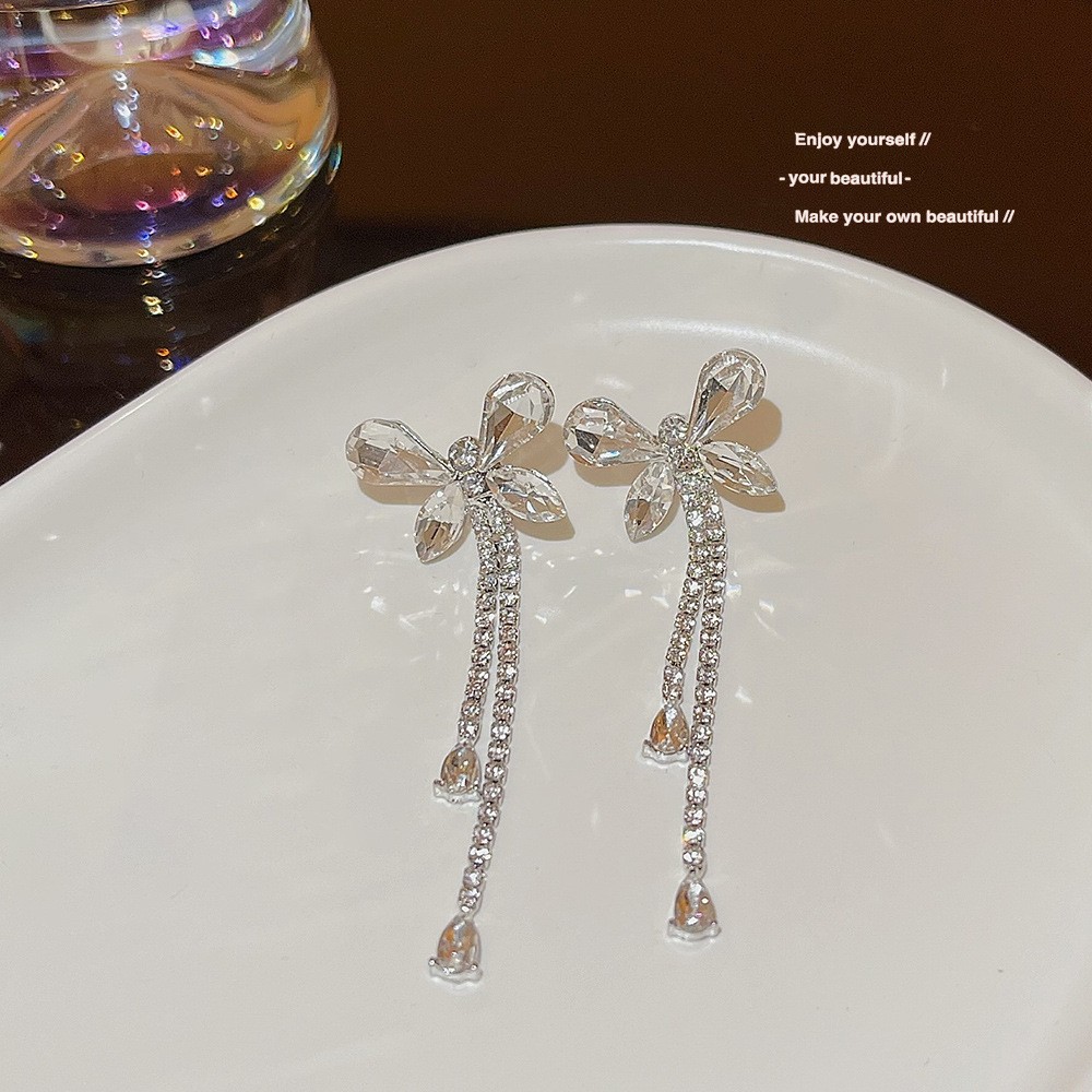 S925 aguja de plata elegante borla pendientes de alta gama simple cara de adelgazamiento pendientes de todo fósforo estilo coreano nuevos pendientes de moda al por mayor