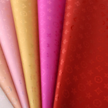 幻彩皮革五月花移膜印花革箱包镜面革手袋钱夹五个花瓣首饰盒面料