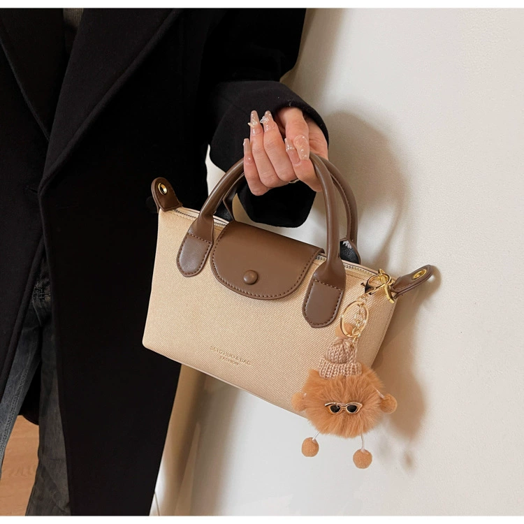Capacious small design handheld one-shoulder bag