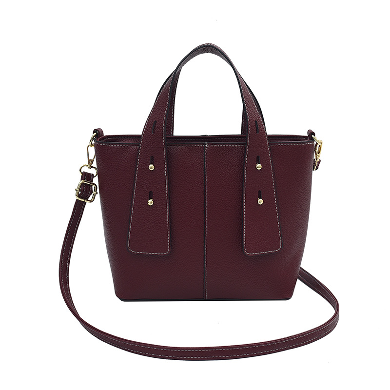 Invierno nuevo estilo 2024 moda bandolera bandolera marea ciudad simple ocio cubo bolso patrón lichi