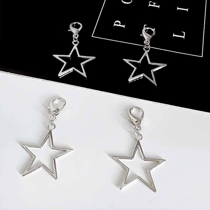 Hueco de cinco puntas estrella titanio Cadena de acero cadena de zapato lateral cadena dulce fresco estrella colgante Martin botas zapatos de lona zapato hebilla colgante