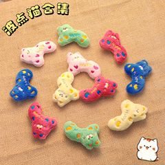 新しいアニメの波点猫の手作りの髪は穴の靴を挟みます。