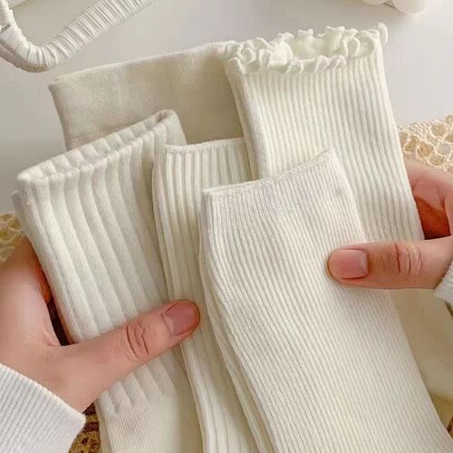 White chunky socks for women, summer Instagram-style, with lace trim and cream-colored mid-calf design—Japanese-style JK-inspired, breathable long socks with ruffled edges.