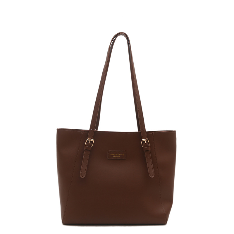 Bolsa de mano de viaje de color sólido bolsa de mano nueva alta alta capacidad axilar otoño y invierno 2024 bolsa de trabajo bolsa de mujer