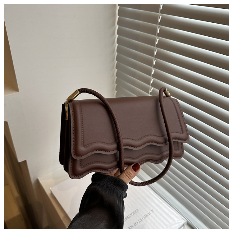 thumbnail image 1 of Bolso de hombro de moda PU para mujer 2025, nuevo estilo, bolso cuadrado estilo coreano, elegante y versátil, bolso de axila., 1 of 10