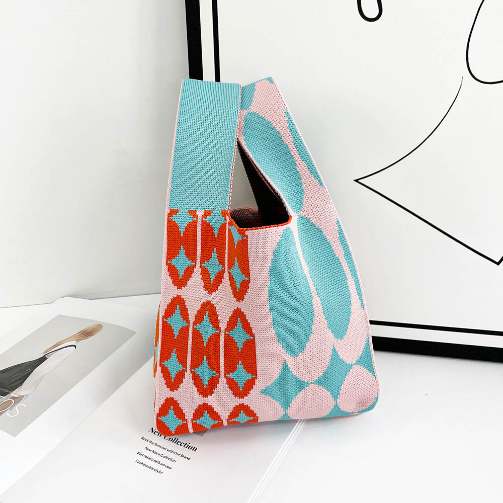 Nuevo bolso de punto para teléfono para mujer, bolso tejido suave en colores dopamina, bolso de mano con forma de corazón en estilo coreano con bloques de color.