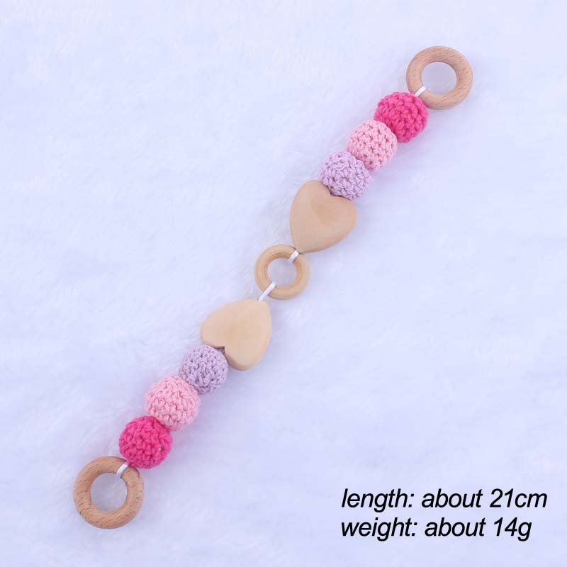 Nueva historieta del bebé haya amor mordedor juguete DIY macaron gran bola de lana mordedura pulsera