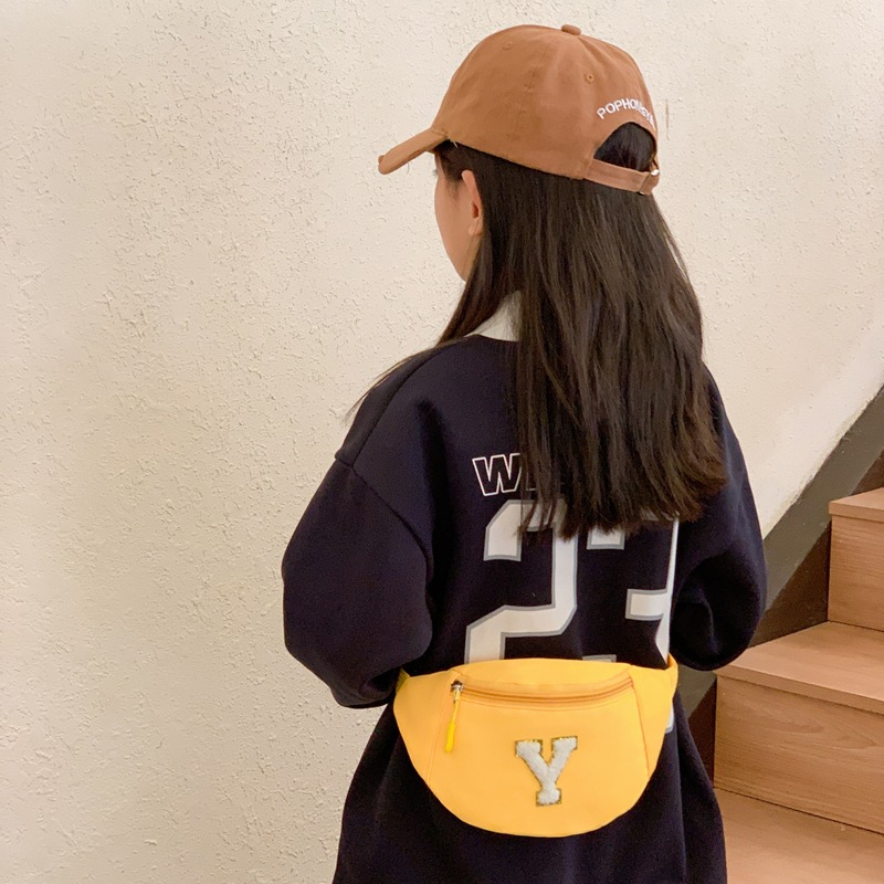 Bolsas coreanas para niños y niñas, bolsas de pecho de color sólido para bebés, 2026 nuevas bolsas de niños transfronterizas