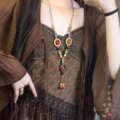 新しい中国の長いタイプの陶磁器の数珠のネックレスの女性の民族の風の禅の意は毛の服のチェーンを編みます国境を越えて鎖の鎖の潮を合わせます。