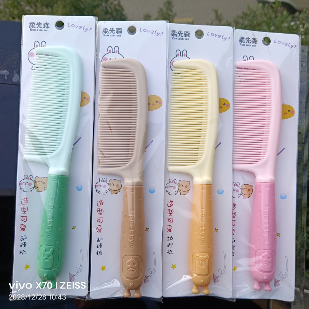 Bonito peine de peinado color macarrón con cojín de aire para masaje, adecuado para uso doméstico y dormitorios estudiantiles, cepillo de pelo de plástico suave con cojín de aire.