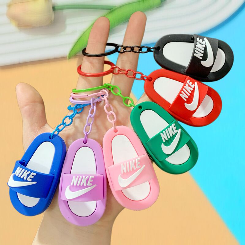 Creative and trendy Nike slipper keychain, cute cartoon backpack and car keychain ornament, holiday gift Creative and trendy Nike slipper keychain, cute cartoon backpack and car keychain ornament, holiday gift