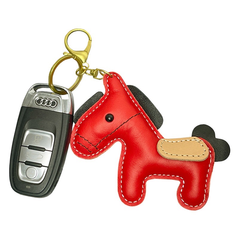 En stock auto-producido y vendido primera capa de piel de vaca todo partido bolsa pony lindo moda coche clave colgante bolsa colgante
