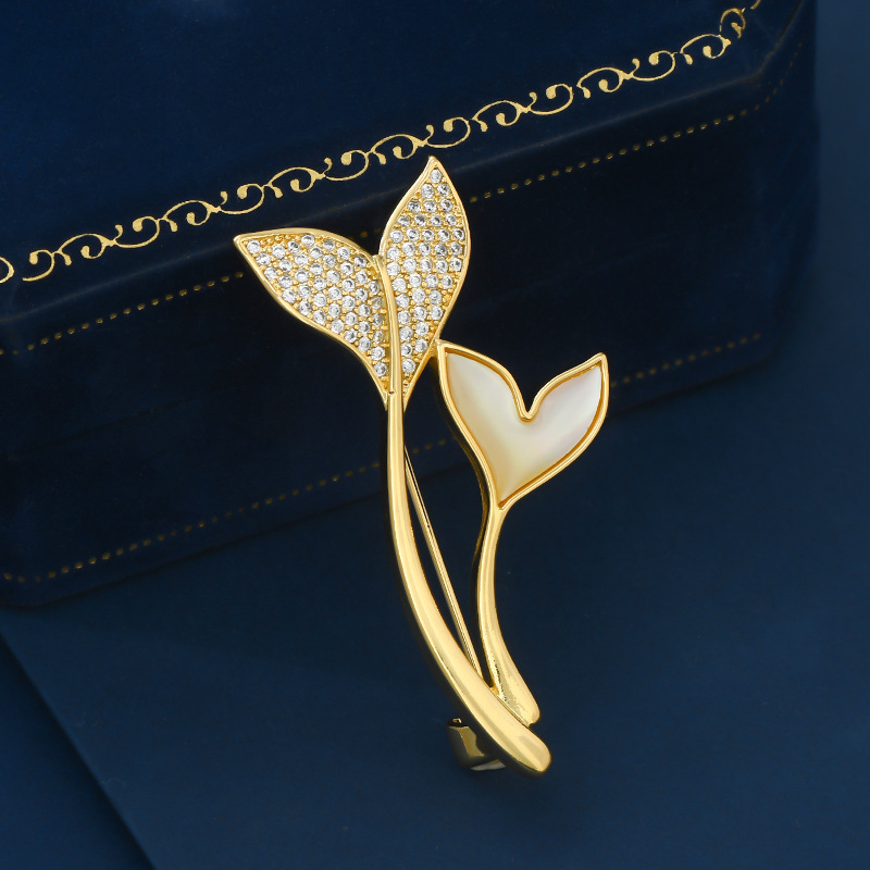 Designer style, personalized fishtail brooch, female high-end feeling, niche inlaid zircon corsage, paired with light luxury suit clothing_voghion.com
