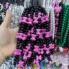 A black beads + 7 rose bows