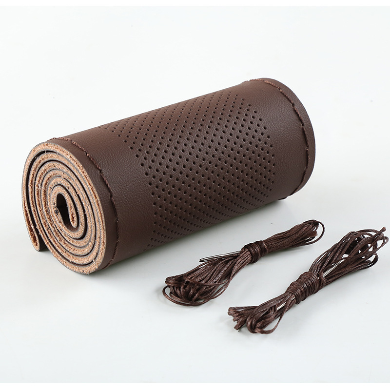 La mano de microfibra artificial que cose la cubierta del volante del coche cuatro estaciones cubierta universal de la manija del coche suministros transfronterizos del interior del coche