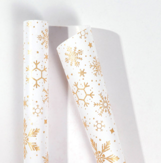 Rollo de papel de regalo de Navidad transfronterizo paquete de tubo de papel de regalo de árbol de Navidad de copo de nieve de oro negro rollo de gran tamaño sentido avanzado