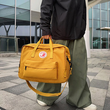 跨境旅行包男女2025新款手提行李包大容量双肩包批发收纳包户外