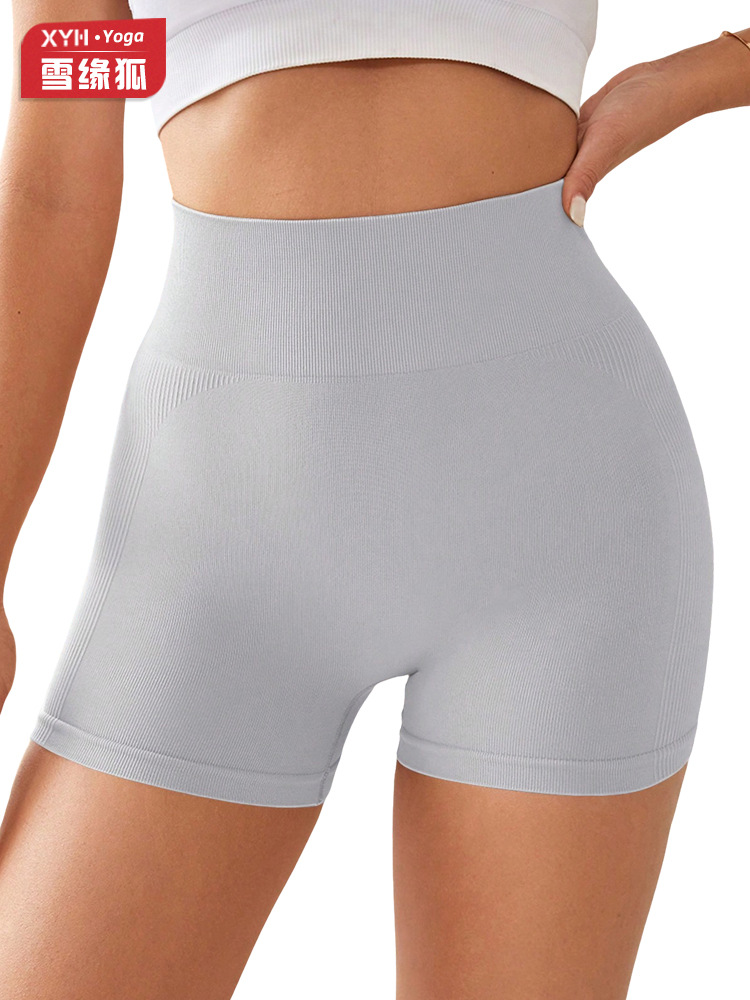 Transfronterizo cintura alta antideslizante sin costuras deportivo de miel de pecado de hiera pantalones cortos para mujeres que corren panty ajustado de acondicionamiento de la piel
