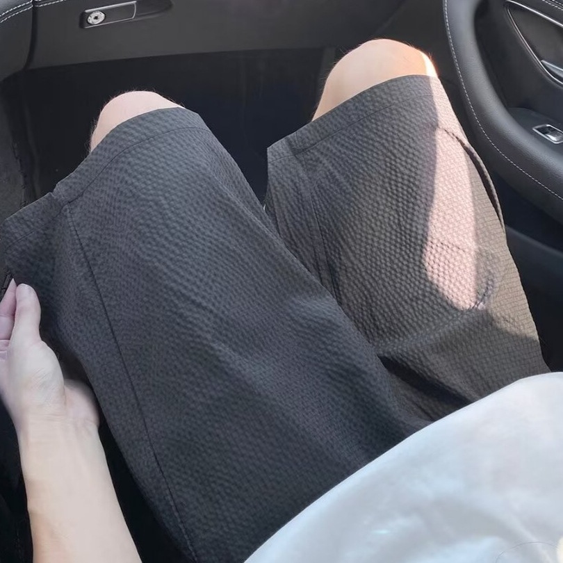 Pantalones cortos de secado rápido a cuadros de burbujas para hombres verano nuevo estilo pantalones de playa de color sólido tendencia americana pantalones delgados de cinco puntos