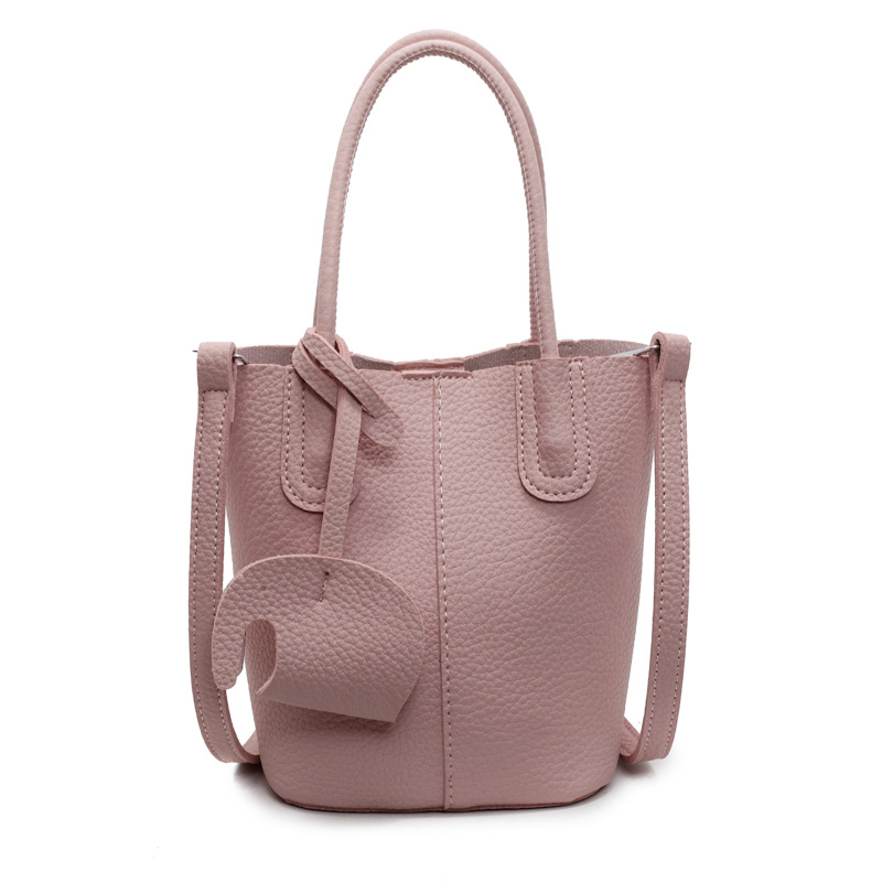Bolso de cubo de venta caliente de comercio exterior, sentido de alta gama de nicho femenino 2025 nuevo bolso de mano simple y versátil, bolso de mensajero de moda y versátil